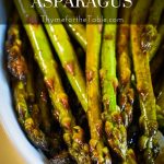 Cooked asparagus with balsamic vinegar on it in a white dish with text: Sautéed on the stovetop balsamic asparagus.