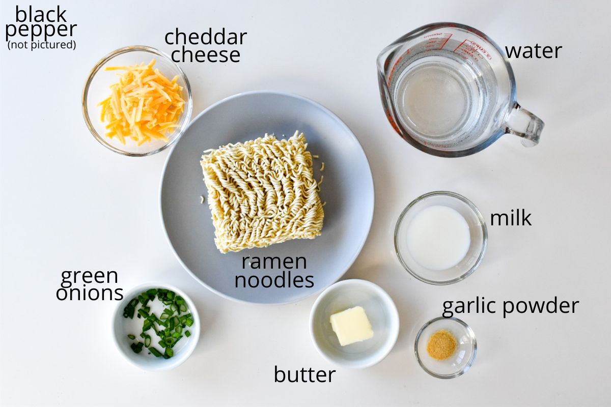The ingredients to make cheesy ramen noodles.