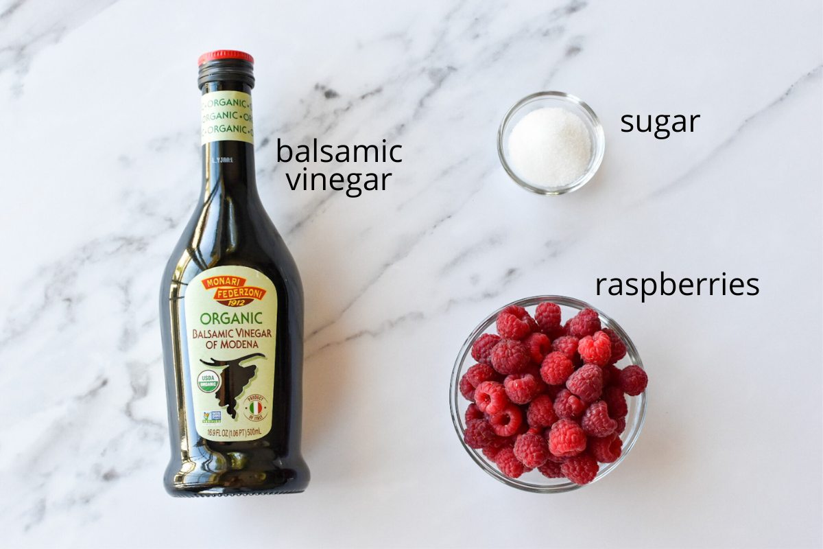 The ingredients to make raspberry balsamic glaze.