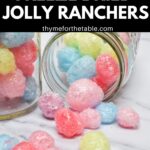 A jar of freeze dried Jolly Ranchers laying on its side with the candy spilling out and the text: How to make freeze dried Jolly Ranchers.